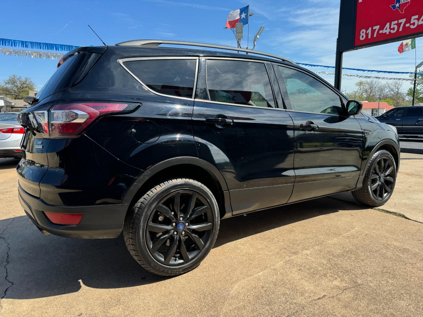 2018 BLACK FORD ESCAPE SE (1FMCU0GD4JU) , located at 5900 E. Lancaster Ave., Fort Worth, TX, 76112, (817) 457-5456, 0.000000, 0.000000 - Photo#3